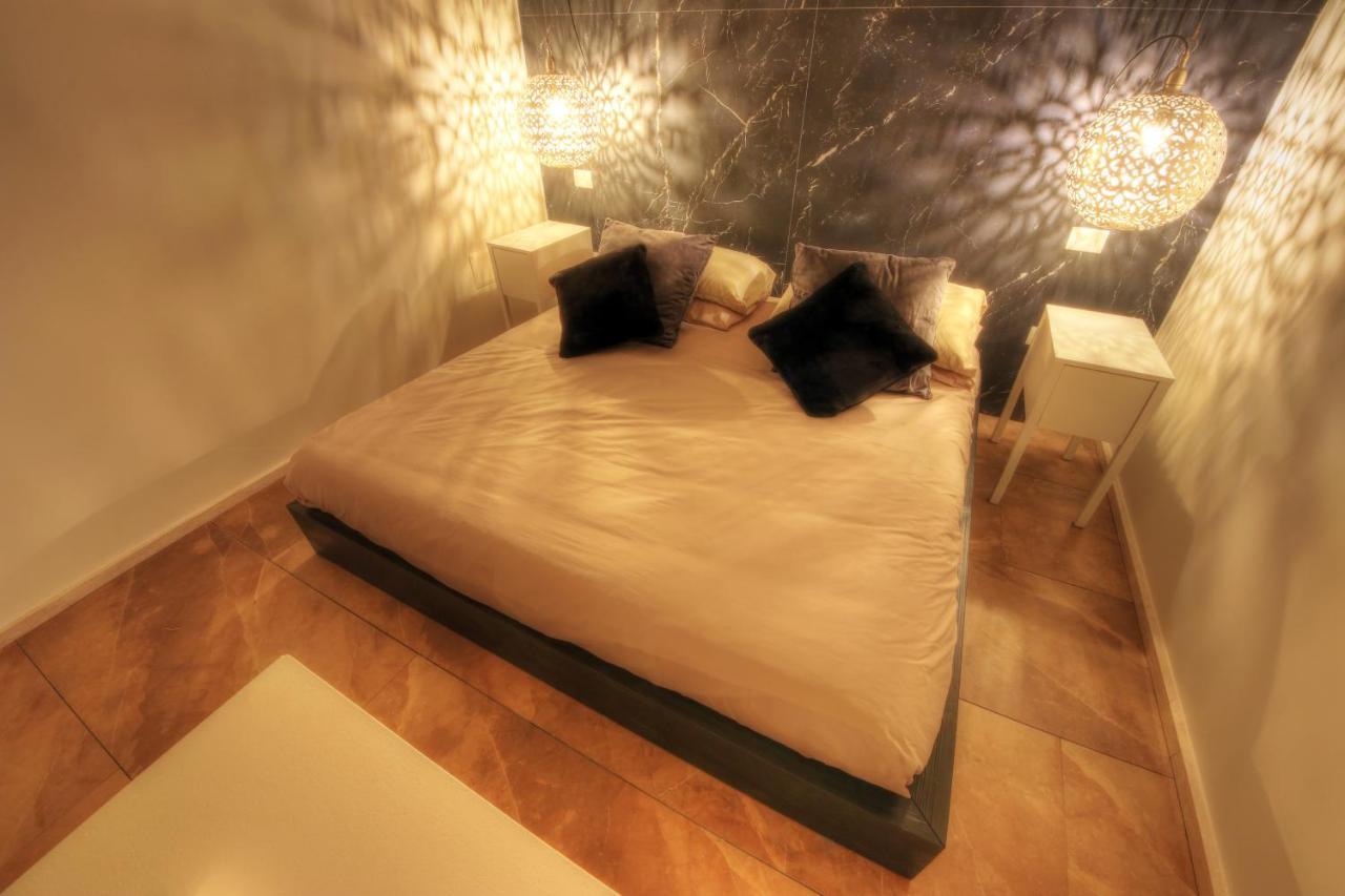Urban Central Suites Cagliari Bagian luar foto