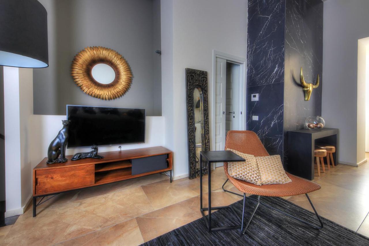 Urban Central Suites Cagliari Bagian luar foto