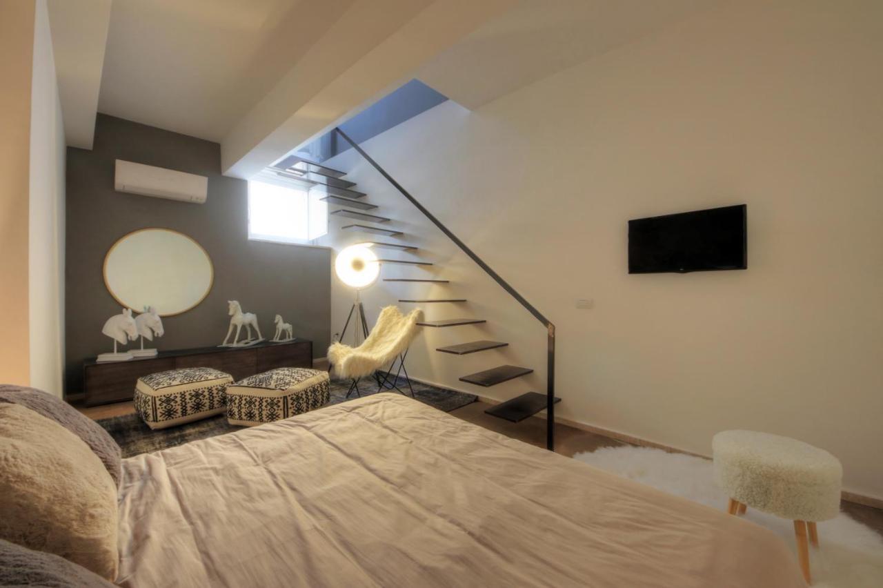 Urban Central Suites Cagliari Bagian luar foto